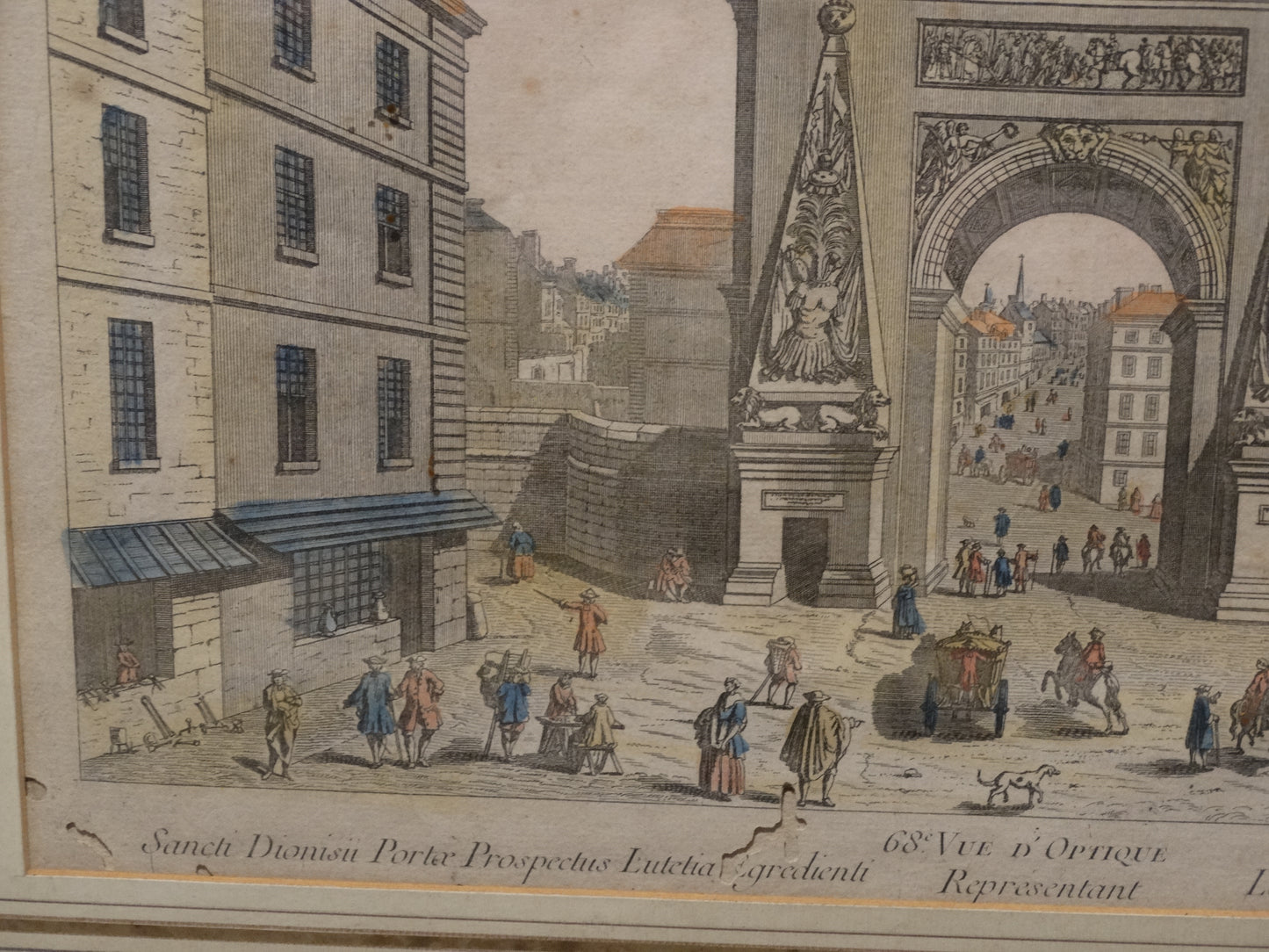 Estampe ancienne : « Vue d’optique représentant la Porte Saint-Denis sortant de Paris » zoom bas gauche
