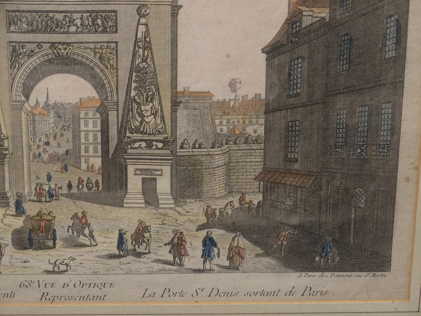 Estampe ancienne : « Vue d’optique représentant la Porte Saint-Denis sortant de Paris » zoom bas droit et légende