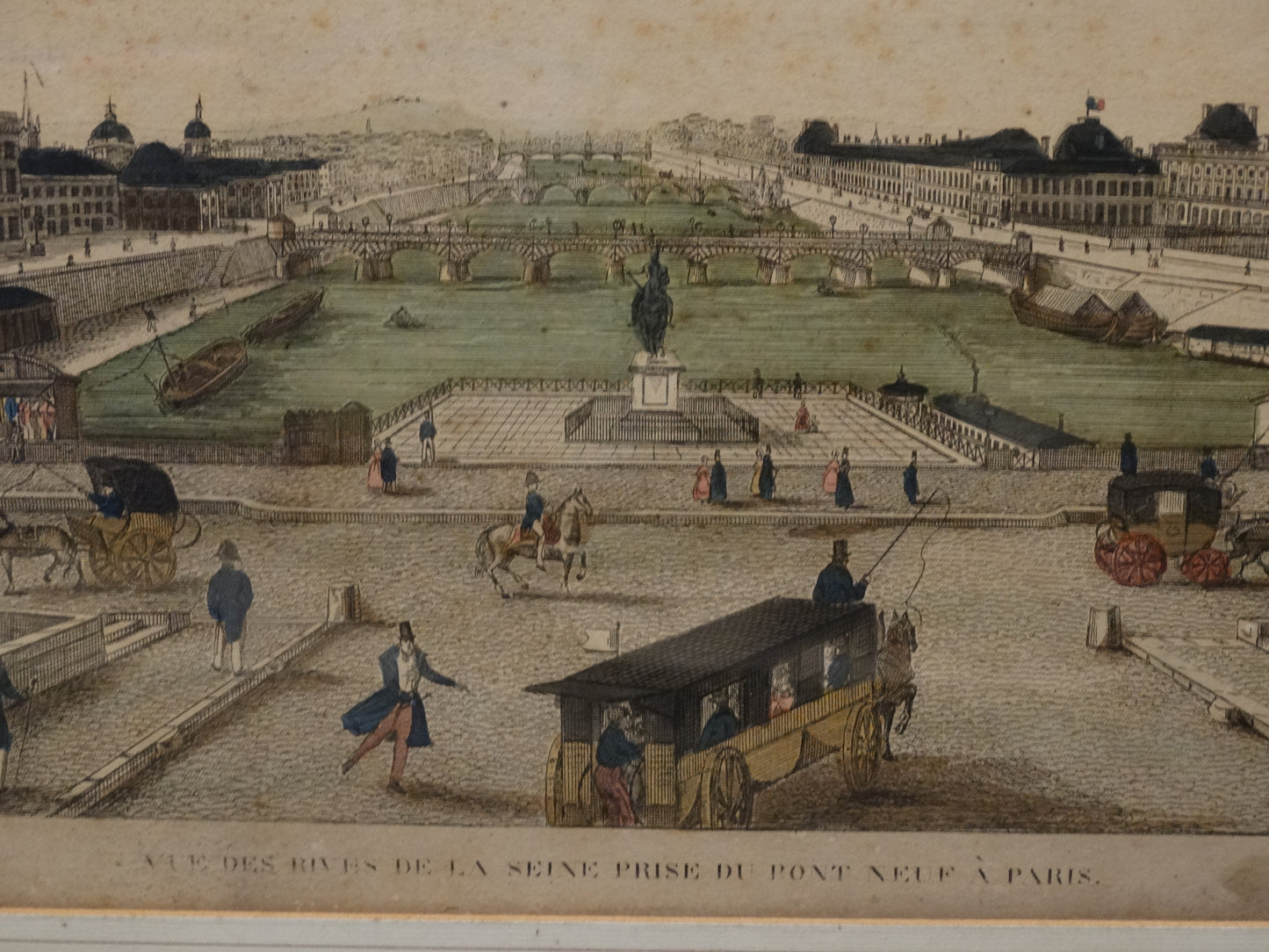 Estampe ancienne : « Vue des rives de la Seine prise du Pont Neuf à Paris » zoom sur légende central bas.