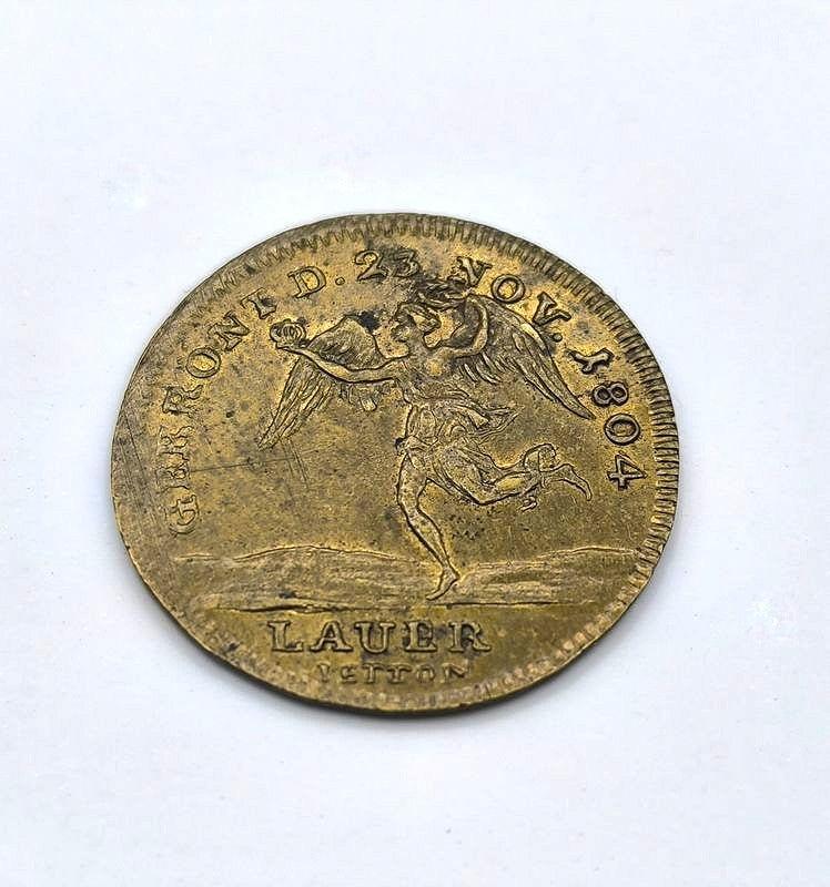 Jeton Napoléon Ier – Couronnement de 1804 | Jeton historique.
Revers