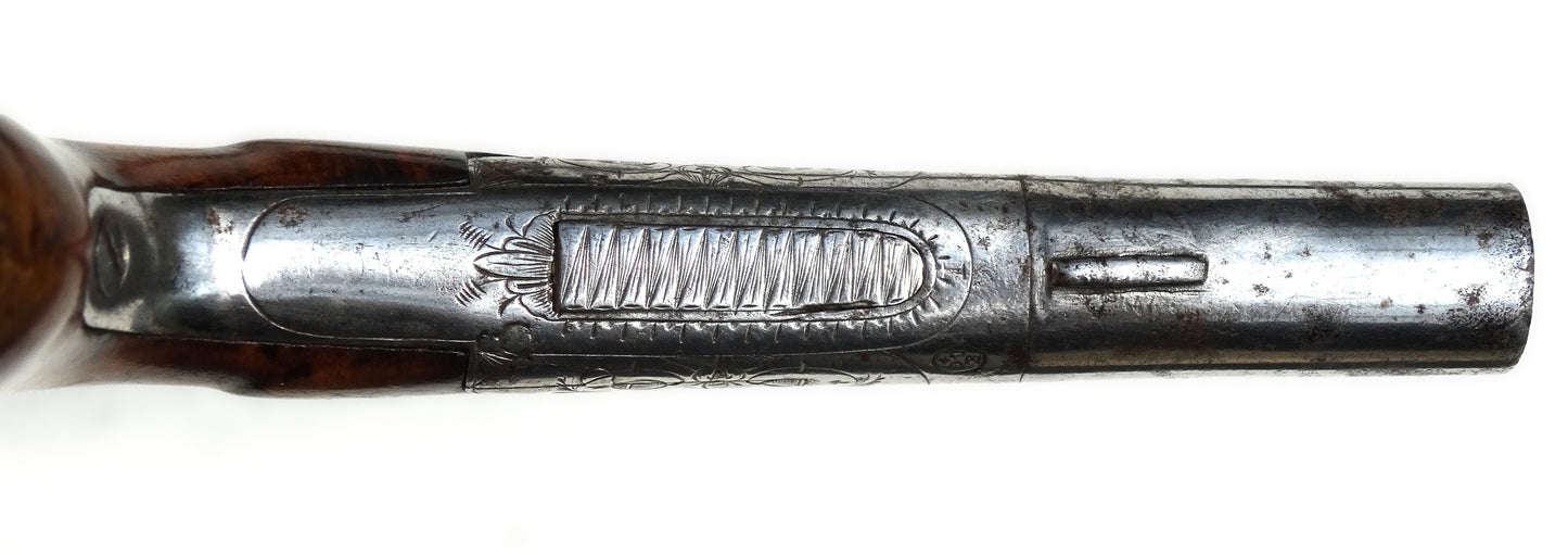 Pistolet de voyage à balle forcée – Liège XIXᵉ siècle • Poinçon ELG.
Vue du dessous détente rentrée.