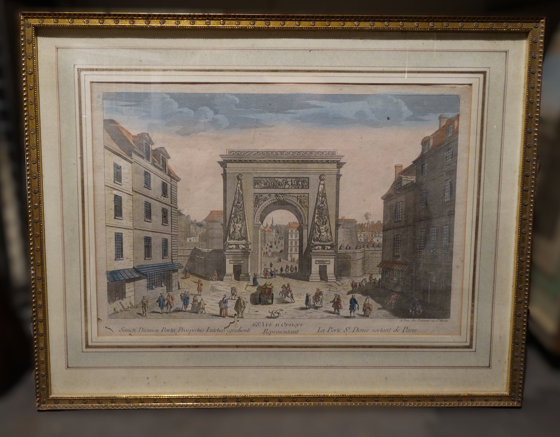 Estampe ancienne : « Vue d’optique représentant la Porte Saint-Denis sortant de Paris » dans son cadre bois doré