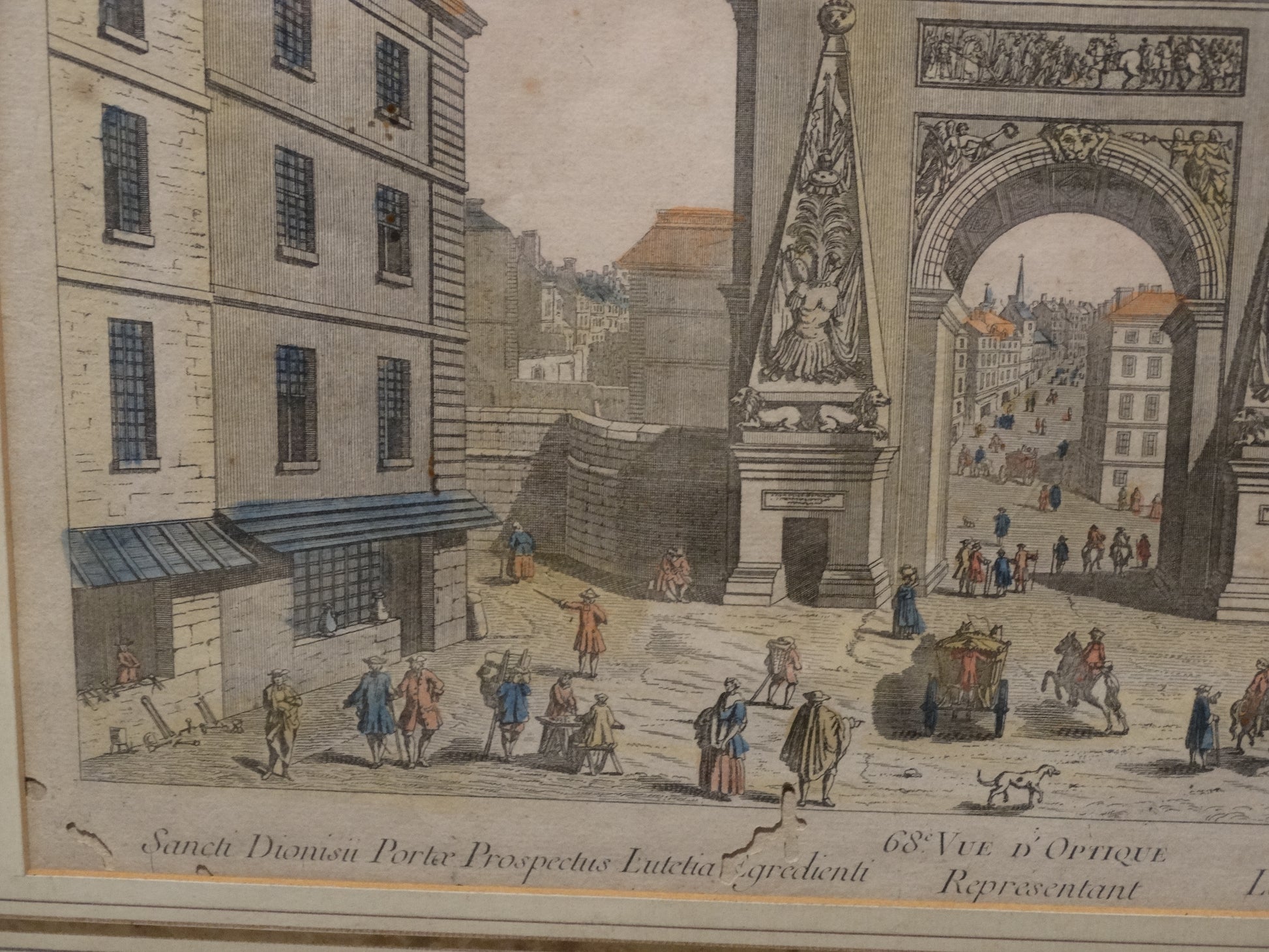 Estampe ancienne : « Vue d’optique représentant la Porte Saint-Denis sortant de Paris » zoom bas gauche