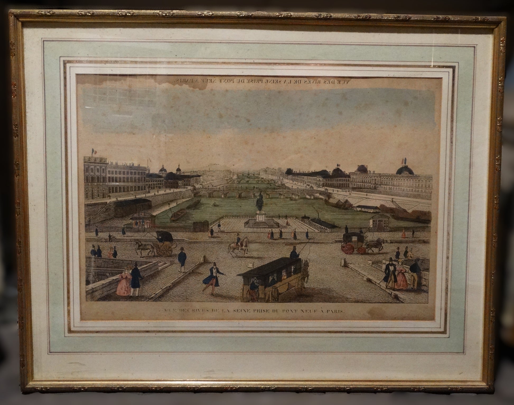 Estampe ancienne : « Vue des rives de la Seine prise du Pont Neuf à Paris » dans son cadre en bois doré.