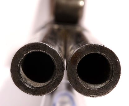 Pistolet coup de poing à percussion double-canon (~ 1860) • Arme de collection. Zoom sur bouche des canons.